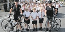 Pedalling pair raise cash for the primary