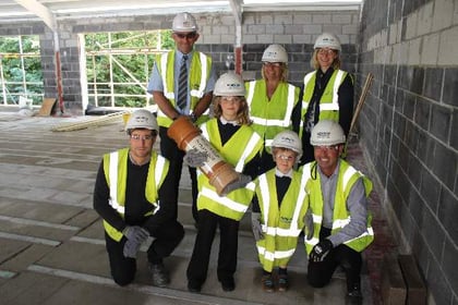 Time capsule placed to mark school building