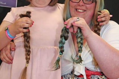 Mother and daughter Sam and Angel Stephens from Callington have hair cut off for Little Princess Trust