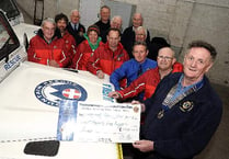 Okehampton Lions give thousands to North Dartmoor Search and Rescue Team