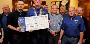 Okehampton Lions Club present cheque to Children's Hospice South West