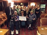 Okehampton Lions present £600 to Children's Hospice South West