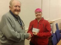 Outgoing Conservative Club president presents £200 to Okehampton's search and rescue team