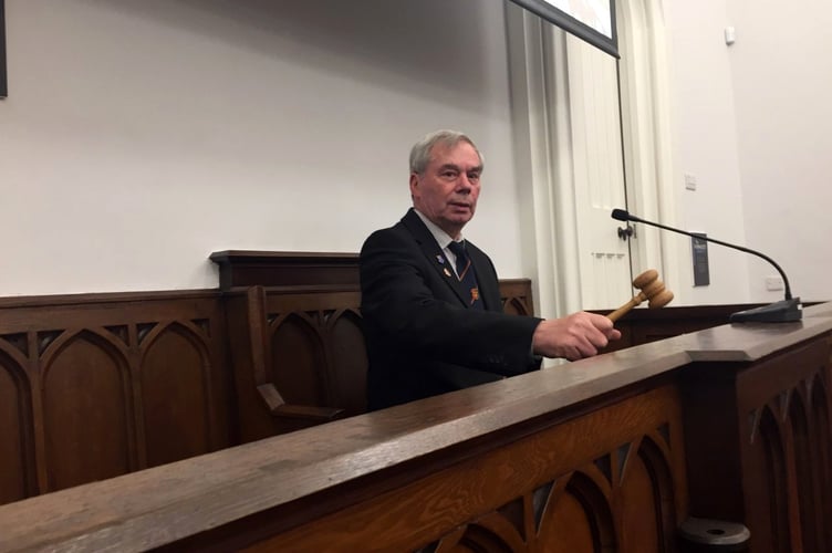 Cllr Harry Smith chairing a meeting in the old magistrate’s court in Tavistock