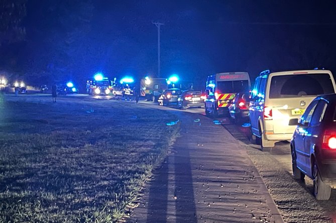 Some of the emergency services and queuing traffic near the accident scene on Thursday evening