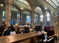 Children open Christmas Tree Festival with carols