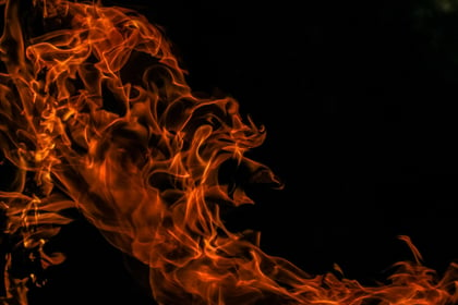 Loader burst into flames inside barn