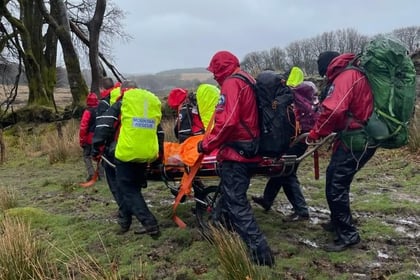 Dartmoor walker rescued in stormy weather by search and rescue team