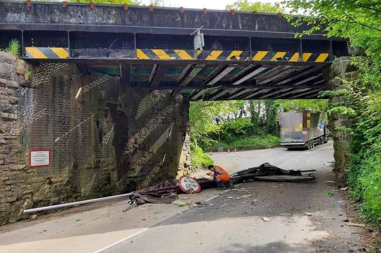 Debris under the railway bridge at North Tawton.