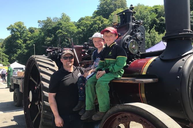 Matt Young of Lamerton with sons Ruben, seven, and Jack, and their steam engine at the Tavistock Steam Fair