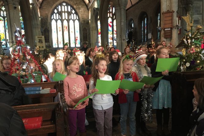 St Rumon's School children singing at the festival