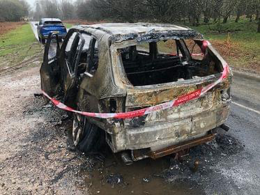 Crapstone road's new obstacle - a burned out car
