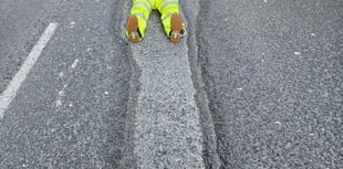 Tavistock's Mr Pothole lies down in crater