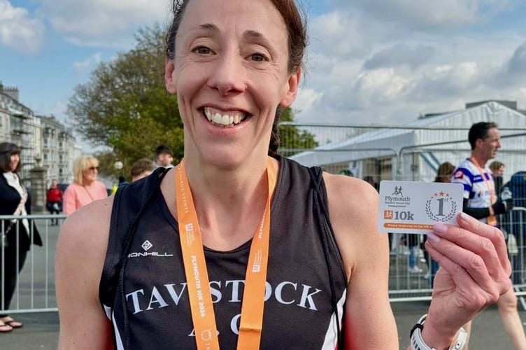 Sam Lake with her medal at the 10k at the Plymouth Festival of Running