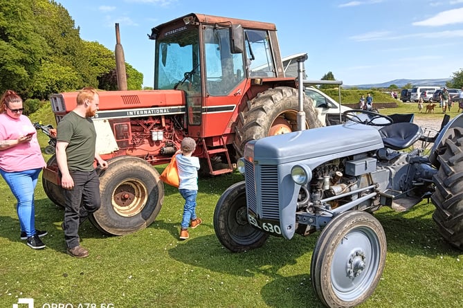 Old and new tractors attract families at Harrowbeer Airlfield.