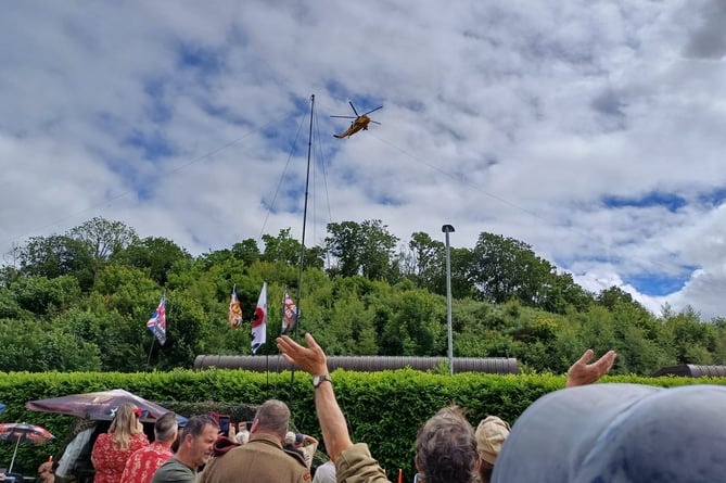The Lifton D-Day helicopter flight arrives to cheers.