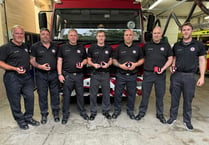 Proud firefighters' service awards