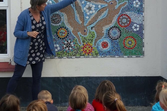 Spreyton School pupils have created a three hares mosaic to adorn their school