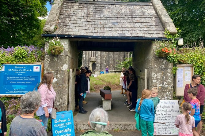 Children from Calstock Primary bringing to life histories of the church as drama.