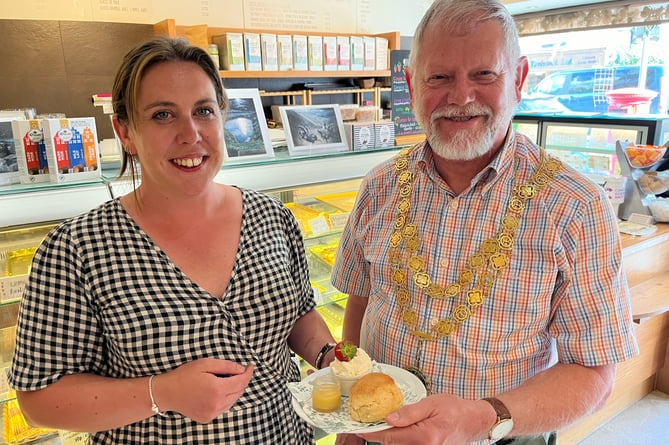 Coffee and Cream owner XX wns a Tavistock Cream Tea best bake award presented by Mayor Paul Ward.