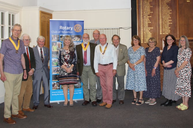 Centre of the front row wearing chain of office President Paul Williams on the extreme left of the picture is the incoming Vice President Roger Aggett together with other club members. 