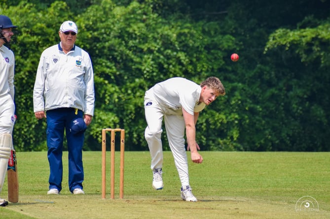 File, image of- Bridestowe's Ethan Guest on the way to a five-wicket haul against Torquay & Kingskerswell