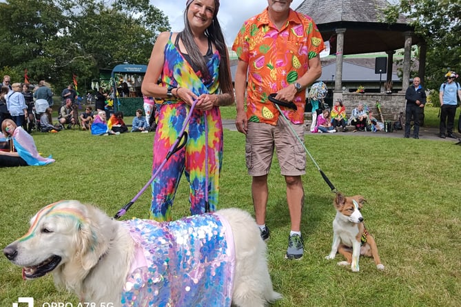 Tavistock Pride dog show proud owner Lorna Mulvihill with pets Cody (Golden Retriever) and Meg (Collie) with friend Paul Martin.