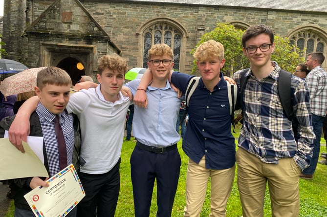 Enjoying the ceremony a Tavistock College GCSE graduation, friends Austin White, Monty Roberts, Ollie Houlberg, Joe Trimmer, Isaac Thomas.