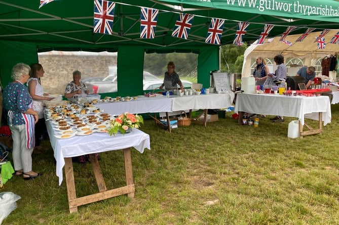 Gulworthy Fete with. mouthwatering spread of home made cakes at a previous event.