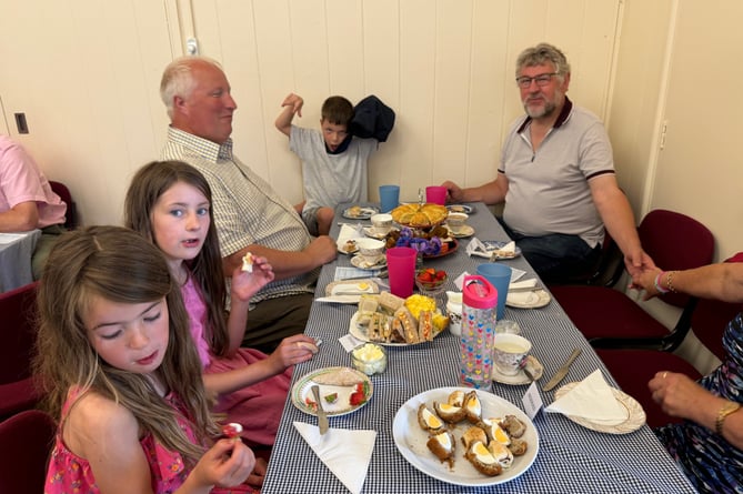 Young and old enjoyed an indoor picnic at Brentor hall.