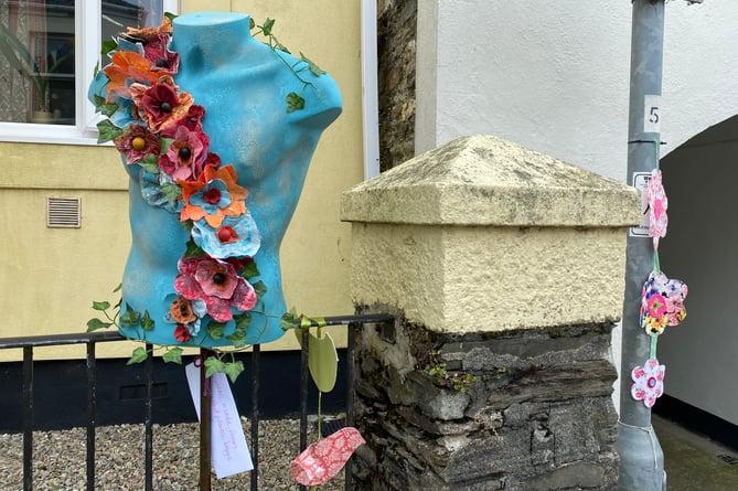 A floral mannequin adds interest to Bere in Bloom.