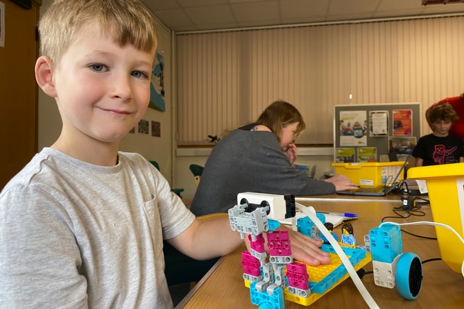 Harris Barclay learning programming and Lego skills at Tavistock Library