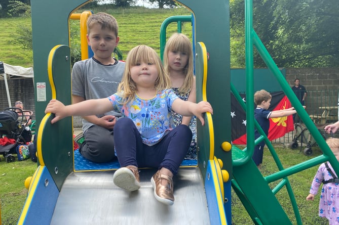 Bannawell Play Park ceremonial opening with Bella-Rose, Ayla-Sky and Rocco on a new slide.