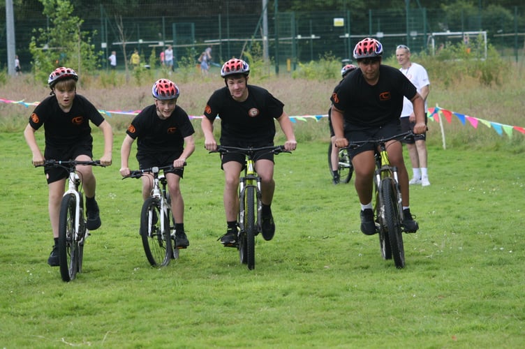 Tavistock College leaders take p[art as guests at the primary schools cyclo-cross at Tavistock College..