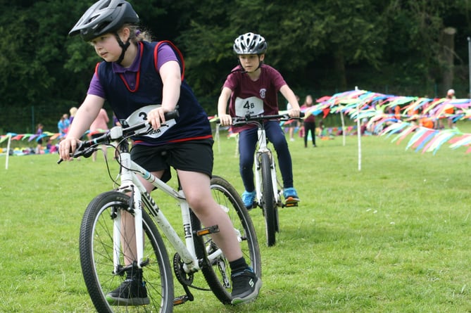 Rounding the bend on the Tavistock College siteof the primary schools cyclo-cross 