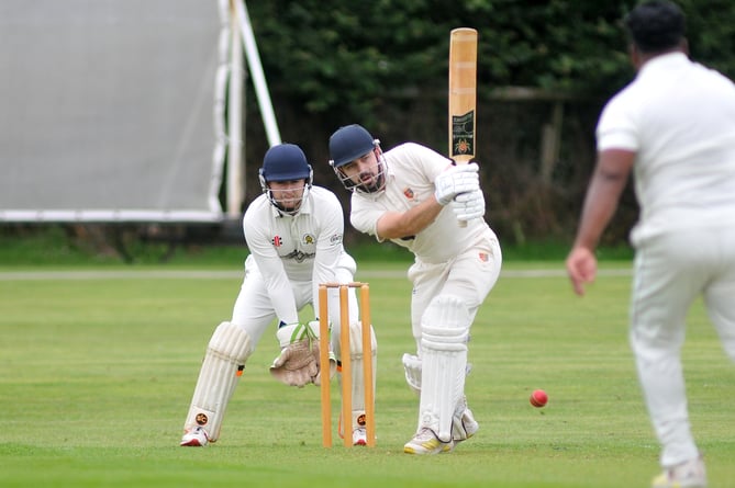 Devon Cricket League A Division. Abbotskerswell versus Tavistock. Tavi batsman Charlie Barriball and Abbots' 'keeper Ed Smout Cooper