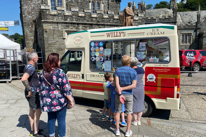 The ice cream van is keeping busy in Bedford Square, Tavistock, today during the mini-