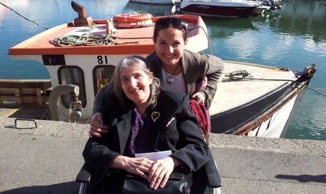 Pip Marshall and her mum Carol  (seated) before Carol died of MS and who inspired her to raise money for the MS Society