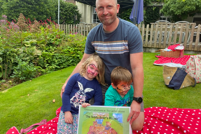 Charlie Roberts with his children Georgie, 4, and  Rhys, 2, at The Garden House holiday teddy bears' picnic.