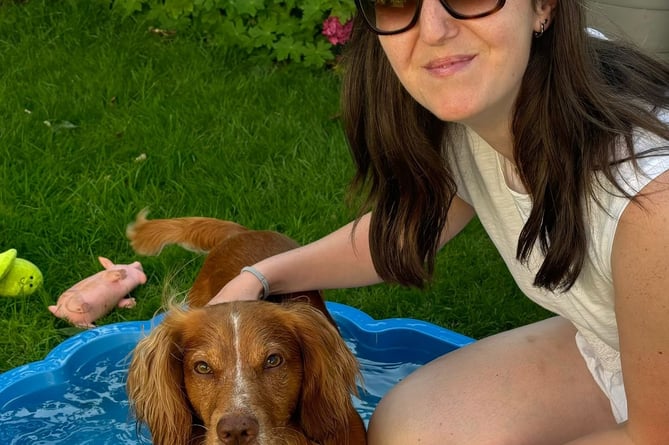 Rosemary Dingle, of Westmoor Vets, Tavistock, with her own dog keeping cool in the recent hot weather.