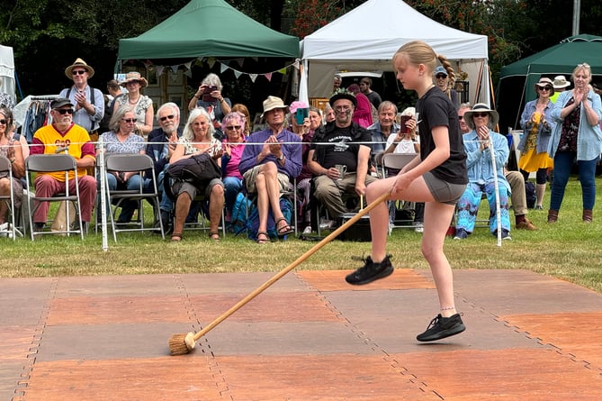 A Dartmoor Broom dancer in action at the Dartmoor Folk Festival.
