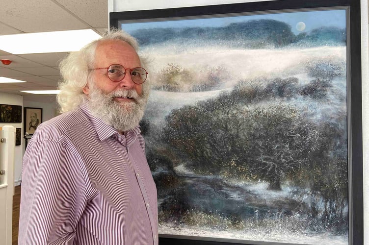 Roger Croxson with one of Ron Pyatt's paintings at the pop up exhibition