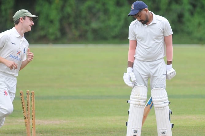 Devon Cricket League C Division West.  Ashburton versus Yelverton Bohemians. Yelverton's Deepanshu Gahlawat looks as his destroyed stumps - courtesy of a ball from Charlie Towers