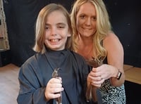 Girl donates long locks in pub fundraiser