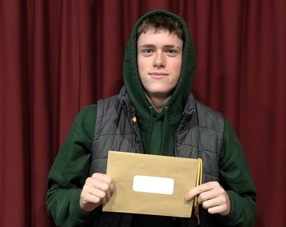 GCSE student Harold Critchley collecting his results at Tavistock College