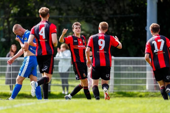 Charlie Elkington and Liam Prynn celebrating for Tavi