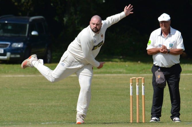 Tavistock spinner Shaun Daymond during his frugal nine-over spell against Torquay & Kingskerswell