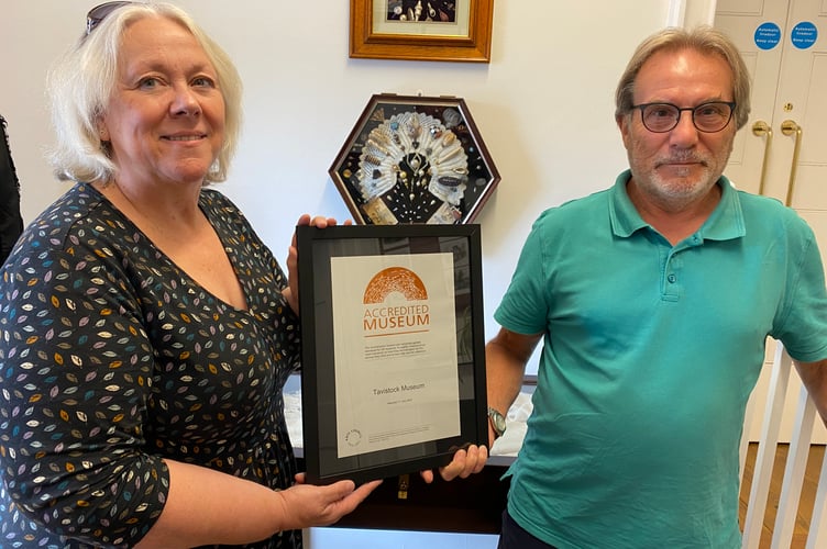 Lesley Holliday and Tony Rose with the Tavistock Museum accreditation certificate