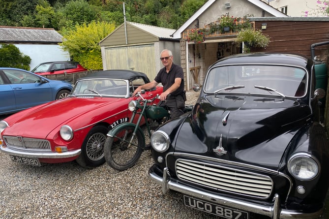 Brian Davis with his classic car and motorbike projects.  JPG