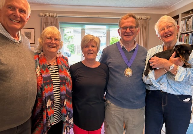 Bob Hines, mayoress Sheila Hines, town mayor Allenton Fisher and Anne Brokenbrow holding Tully the dog at the Hospiscare coffee morning